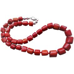 On offer is this very beautiful Large Red Coral Necklace. Precious red coral is the common name given to Corallium Rubrum and several related species of marine coral. The distinguishing characteristic of precious corals is their durable and intensely colored red skeleton, which is used for making jewelry.  The gleaming coral gems are large stunning free form shapes measuring from 12 mm x 12 mm and graduating to 9 mm x7mm at the clasp.  This necklace is hand knotted with red silk cord with a 925 Red Coral Polished Beads For Jewelry Making, Large Red Coral Beads For Jewelry Making, Red Coral Beads For Jewelry Making, Polished Coral Beaded Necklaces, Coral Red Beaded Necklaces With Polished Beads, Red Coral Gemstone Beads For Jewelry Making, Coral Beaded Necklaces With Polished Red Coral Beads, Red Coral Jewelry With Natural Stones, Beaded Red Coral Necklaces In Coral Color