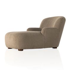 This indoor chaise lounge chair updates your relaxation game by taking a classic furniture piece and modernizing it. A high wing back pairs with softly recessed arms for a curvy look and supportive place to sit. It has a solid wood frame that rests on low-profile bun feet in a warm brown tone. Wrapped in neutral-hued, it's also foam-filled, inviting you to lean back and enjoy a brief snooze. This chair can easily accommodate up to 250 lbs. Joss & Main Body Fabric: Camel Sheepskin Alura 36" W Lou Brown Tone, Chaise Lounge Chair, Warm Brown, Classic Furniture, Birch Lane, Joss And Main, Furniture Chair, Signature Style, Chaise Lounge