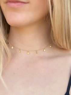 Circle charm choker ✦ Details ✦ ✧ This necklace can be worn from 14-16 inches long. The chain is 14 inches long with a 2 inch extender. ✧ This necklace is available in sterling silver or gold filled. ✧ The circle charms are 4.25mm in diameter. ✦ ABOUT GOLD FILLED ✦ ✧ Gold filled is an actual layer of gold-pressure bonded to another metal. ✧ Gold filled does not flake off, rub off or turn colors. ✧ Most people with jewelry sensitivities can wear gold filled without worries of any allergic reactio Adjustable Delicate Chain Charm Choker, Adjustable Delicate Chain Choker Charm Necklaces, Delicate Adjustable Choker Charm Necklaces, Delicate Everyday Charm Necklace Choker, Delicate Everyday Charm Choker Necklace, Delicate Charm Choker Necklace For Everyday, Dainty Sterling Silver Choker With Delicate Chain, Minimalist 14k Gold Filled Dangle Charm Necklace, Minimalist 14k Gold Filled Choker