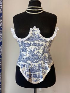 "Handmade Blue toile under bust corset made with sustainable and recycled fabrics. Laced at back with silver grommets and cream satin ribbon. Waist 25\" - 29\"" Custom Corsets, Under Bust Corset, Blue Toile, Corset Style Tops, Underbust Corset, Cropped Tube Top, Corset Style, Historical Clothing, Recycled Fabric