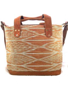 Part of our Jaspe Collection, the Laguna Day Bag is made in a small town on the shores of Lake Atitlan, Guatemala. Artisans take natural cotton yarn and tie knots to form the desired pattern. The yarns are then naturally dyed using local plants and insects, and then hand woven to create the Jaspe pattern. A smaller version of our beloved Laguna Weekender, the Laguna Day Bag is the perfect size for everyday use. DETAILS Handwoven textile Naturally dyed Leather straps and details Metal zippers Ext Lake Atitlan Guatemala, Woven Bags, Lake Atitlan, Hand Woven Textiles, Day Bag, Naturally Dyed, Tie Knots, Woven Bag, Bag Bag