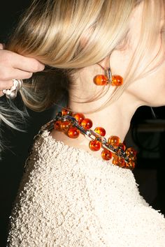 A chunky, linked statement necklace punctuated with amber colored beads. About 19" long including the clasps. Sphere Earrings, Saturn Necklace, Jewelry Product Shots, Jewelry Photography Styling, Chunky Bead Necklaces, Big Balls, Ball Necklace, High Jewelry, Diy Necklace