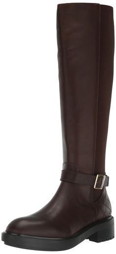 PRICES MAY VARY. Make your style a notch above the rest wearing the Steve Madden Georgi Boots. Featuring a knee-high silhouette, the round toe pair features leather upper construction with ankle buckled strap and zippered side closure. Synthetic lining and insole. Stacked heels. Synthetic rubber outsole. Imported. Tall Brown Boots, Synthetic Rubber, Stacked Heel, Brown Boots, Low Heels, Knee High Boots, Special Features, Knee High, Steve Madden