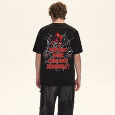 **Fire designs with luxury blanks, Only at aoklok graphic brand. Unleash your inner superhero with the AG® Great Power Spider-Man T-shirt! Made with premium materials, this shirt features a bold graphic of Spider-Man unleashing his powers. Perfect for casual wear or a costume, it's a must-have for any fan of the web-slinging hero. Features: -100% Cotton -Crew Neckline -Super Soft Fabric -Loose -Solid Color -Regular fit -Urban style Superhero Black Tops For Streetwear, Halloween Graphic Top For Streetwear, Halloween Logo Print Tops For Streetwear, Urban Black Top With Sublimation Print, Urban Black Tops For Halloween, Graphic Tee With Character Print And Crew Neck, Black Graphic Tee With Sublimation Design, Urban Black Tops With Sublimation Print, Black Urban Top With Sublimation Print