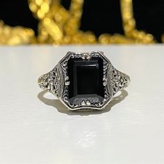 Sterling Silver Black Sapphire Ring....Marked 925...Total of weights 2.6grams... Size 8...Measure of Face 11.9MM...It's in very good condition. Black Sterling Silver Filigree Ring As A Gift, Antique Black Jewelry Stamped 925, Victorian Black Sterling Silver Rings, Victorian Style Black Sterling Silver Rings, Classic Black Engraved Promise Ring, Black Heirloom Jewelry For Collectors, Vintage Sterling Silver Ring With Black Enamel, Vintage Sterling Silver Rings With Black Enamel, Classic Sterling Silver Jewelry With Black Enamel