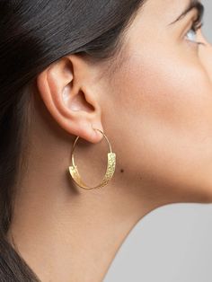 Elevate your style with our Eibar Chunky Gold Hoop Earrings. These handmade hammered hoops, crafted from 925 sterling silver, add a bold touch to any outfit. With a touch of sophistication, they're perfect for any bohemian jewelry lover. Modern Gold Hammered Hoop Earrings, Hammered Gold Sterling Silver Hoop Earrings, Hammered Gold Plated Hoop Jewelry, Hammered Gold-plated Hoop Jewelry, Elegant Small Hoop Hammered Earrings, Elegant Small Hammered Hoop Earrings, Hammered Gold-plated Small Hoop Earrings, Small Gold Plated Hammered Hoop Earrings, Small Hammered Gold-plated Hoop Earrings