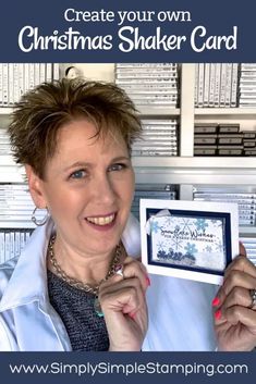 a woman holding up a christmas shaker card with the words create your own christmas shaker card