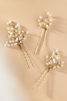 The Twigs & Honey Dainty Beaded Fern Leaf Hair Pins feature intricate beaded designs that capture the elegance of fern leaves, adding a whimsical and nature-inspired touch to any hairstyle. | Dainty Beaded Fern Leaf Hair Pins, Set of 3 by Twigs & Honey in Gold, Women's, Freshwater Pearl/Glass at Anthropologie Pearl Hair Clips, Hair Decor, Beaded Designs, Hair Brooch, Fern Leaves, Fern Leaf, Pearl Hair Clip, Wedding Party Jewelry, Flower Hair Accessories