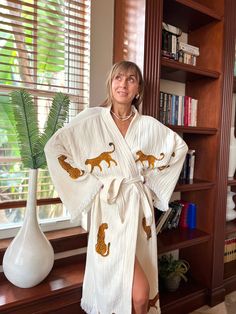 "100% Turkish Cotton Robe with handprinted Tiger Design  Available in one size. Light weight Double Gauze Fabric. 100%  Organic cotton with crinkly texture.  Open Front/loose fit The robe features a kimono collar with belt  Natural Colouring Stone Printed Design  Sustainable Fabric dyed with  plants and natural sources. Fits Mostly women's sizes 0-16. Wash cold, let it air-dry naturally  Made in Turkey  For an everyday option , we adore the Turkish organic cotton that features a kimono collar wh Embroidered Long Sleeve Robe For Loungewear, Women’s Robe, Satin Robe Aesthetic, Cute Robes, Fancy Robe, Comfy Robe, Women Nightwear Dresses, Kimono Collar, Womens Robe