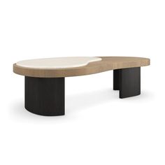 an oval shaped table with black legs and a white top, on a white background