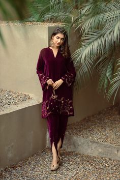 PRODUCT DETAIL: This wine velvet set comes laden with delicate and beautiful embroidery. It is accompanied by tulip pants with delicate embroidered motifs. The overall look can be enhanced with a matching wine embroidered potli.  *Dry Clean only SPECIFICATIONS: Color Wine Fabric Suit: Velvet  Dupatta: Semi Organza Prod Luxury Silk Thread Unstitched Suit For Festive Season, Luxury Jamawar Dress With Pallu, Luxury Unstitched Suit With Intricate Embroidery For Festive Season, Luxury Velvet Salwar Kameez With Dabka Embroidery, Luxury Festive Unstitched Dola Silk Suit, Luxury Unstitched Suit With Pallu For Diwali, Luxury Festive Pant Set With Dupatta, Luxury Unstitched Suit For Eid Ceremony, Luxury Velvet Long Sleeve Salwar Kameez