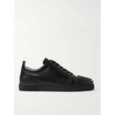 The 'Louis Junior' low-tops are a core design in Christian Louboutin's sneaker collection, and this 'Spikes' version perfectly melds the label's classic appeal and rock 'n' roll flare. They're made from smooth black leather, fitted with sleek tonal eyelets and laces, and finished with conical hardware on the toecaps. Wear them with slim, dark jeans. Christian Louboutin Sneakers, Saint Laurent Jeans, Leather Sneakers Men, Dark Jeans, Lace Fashion, Sneaker Collection, Leather Sneakers, Top Sneakers, Christian Louboutin