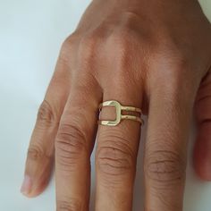 14K solid gold ring in a minimalist style for lovers of geometric shapes. ◈ DETAILS Weight: 3g Width upper part-9mm / 0.35'' Thickness-1.3 mm / 0.05'' ◈ MATERIAL 14K Solid Gold - Smooth,shiny,plain surface ◈ ALSO AVAILABLE IN 14K/18K/9K Yellow, Rose, or White Gold ◈ ENGRAVING is optional ◈ SHIPPING is insured express and free worldwide ◈ GIFT WRAPPING is included with every purchase ✧ Back to my shop for more handcrafted gold jewelry: https://etsy.me/38Cs5Zl If you have any questions, I will be Adjustable Modern Initial Ring In 14k Gold, Modern Adjustable 14k Gold Initial Ring, Modern Gold Stackable Initial Ring, Modern Adjustable Initial Ring With Open Design, Modern Adjustable Initial Open Ring, Modern Adjustable Initial Ring For Everyday, Minimalist Open Couple Rings With Simple Design, Minimalist Couple Rings With Open Design, Minimalist Adjustable Yellow Gold Initial Ring