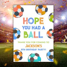 a birthday card with soccer balls on it and confetti falling from the sky