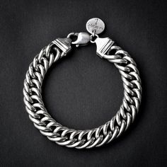 A handmade sterling silver 925 round shaped dense chain bracelet. Each bracelet is cleaned and polished with care. The weight of the bracelet may vary according to size. Approx weight: 67gr Chain link witdh: Approx 11.86mm Chain link thickness: Approx 6.60mm The bracelet is made of sterling silver 925 and is water resistant. Please refer to our measuring guide in the Q&A section to find out your exact wrist scope. This bracelet is made to order! Please allow up to 7 business days to be made befo Double Chain Bracelet, Silver Skull Ring, Skull Jewelry, Silver Chain Bracelet, Unisex Bracelets, Double Chain, Bracelet Sterling Silver, Fancy Jewelry, Photo Bracelet