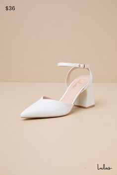 Walking down the street just got a lot more chic thanks to the Lulus Alodie White Pointed-Toe Ankle Strap Pumps! Smooth faux leather shapes these must-have heels that feature a pointed-toe upper with a V-cut collar and slender straps that wrap and secure around the ankle with a gold buckle. A chunky block heel completes the look. 3. 5" Wrapped Block Heel. Lightly Cushioned Insole. Rubber Sole Has Nonskid Markings. Man Made Materials. Imported. Lulus | Alodie White Pointed-Toe Ankle Strap Pumps. Classic Wedding Shoes, White Bridal Shoes, White Block Heels, Walking In Heels, Walking Down The Street, White Wedding Shoes, White Pumps, Chunky Block Heels, Ankle Strap Pumps