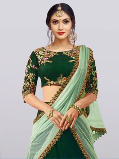 Showcase your best ethnic look with this mesmeric "dark green embroidered taffeta silk bridal lehenga choli" for women. Crafted from exquisite green color taffeta silk material, this lehenga exudes elegance and grace. The intricate dori work, zari work, and thread embroidery add a touch of opulence, making it a perfect choice for weddings, engagements, ethnic wear, evening events, and other special occasions.
The set includes a beautiful lehenga, a choli, and a net dupatta, all adorned with matc Green Organza Traditional Wear For Reception, Green Organza Choli For Reception, Designer Green Lehenga With Traditional Drape, Green Organza Traditional Wear With Traditional Drape, Traditional Green Organza Wear With Traditional Drape, Green Lehenga With Traditional Drape For Designer Wear, Green Organza Traditional Wear For Navratri, Designer Green Art Silk Sharara, Green Organza Choli With Intricate Embroidery