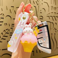 Say hello to your newest (and cutest) accessory - our Ice Cream Bunny Key Chains! These kawaii key chains are sure to bring a smile to your face every time you reach for your keys. With their sweet ice cream cone design, they're a quirky addition to any keyring. Ice Cream Cone Design, Bunny Ice Cream, Panda Iphone Case, Unicorn Plushies, Kawaii Ice Cream, Cone Design, Nintendo Switch Case, Kawaii Games, Kawaii Bags