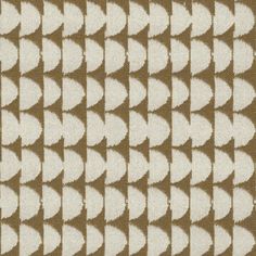 a brown and white pattern on fabric