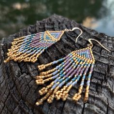 Beautiful and glamorous boho style fringe earrings will elevate your look instantly. It is handmade and handwoven with the high quality 11' size Japanese Miyuki Delica glass seed beads including the real gold covered ones, and durable nylon thread, has the 925 sterling silver ear wire closures. Bright and happy colors and lightweight design look amazing in any light!  Handmade with love in Charlotte, NC Length: 2 Inch , comes in a box, securely packaged.  Shipping within the US is free International shipping cost is based on the destination and will be calculated by Etsy at the Check out Boho Fringe, Earrings Beaded, Seed Bead Earrings, Happy Colors, Boho Stil, Fringe Earrings, Charlotte Nc, Bead Earrings, Style Boho