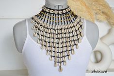 Bohemian Beaded Shell Choker Necklace, Handmade Bib Necklaces For The Beach, Bohemian Adjustable Bib Necklace Choker, Handmade Shell Bohemian Choker, Handmade Bohemian Bib Necklaces For The Beach, Handmade Bohemian Bib Necklace For Beach, Bohemian Cowrie Shell Choker, Handmade Black Bohemian Shell Necklace, Handmade Bohemian Black Shell Necklace