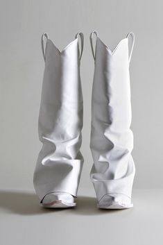 Mid Cowboy Boot with white leather toe and white leather sleeve. Two inch heel with pointed toe. Color: White Tall Cowboy style boot 100% Leather sleeve Made in Italy R13S0107-S002A This style runs slightly small. If in between sizes, we recommend sizing up. White Goth, Fold Over Boots, White Cowboy Boots, Fashion Cowboy Boots, Open Toe Boots, Preformance Outfits, Cowboy Outfits, Futuristic Fashion, Cowboy Style