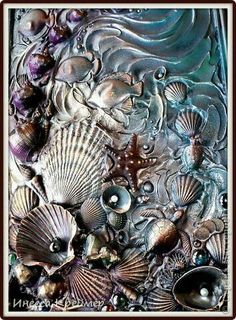 some shells and other things on a metal plate