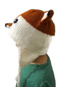 This beanie hat is one size. The hat stretches and it fits from a 3-year-old child up to adult. It is made of wool and it has white fleece linen inside.Measurements:Head circumference: 20" to 24"Hat Length: 7" to 8" Earflaps Length: 6"Care Instructions:Gently Hand washDo not wringLay flat to dryDo not Tumble dry Connect with us on Instagram and Facebook: @latinamericanboutique Fox Beanie, Knitted Wool Beanie, Hat For Kids, Blue Tissue Paper, Star Fox, White Fleece, Wool Winter, Wool Beanie, Cute Fox