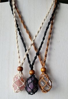 Macrame crystal pouch necklace, Amethyst necklace, Tumbled stones, These pouch are boho style, Available in 3 colors and 3 different stones, These are adjustable with a wood bead so you can wear it short or Long as desired. Size: Adjustable to 16'' - 28'' Material: White, brown and White macrame cord pouch necklace, Rose quartz, amethyst and Clear quartz tumbled stones, Wood beads. You receive ONE similar necklace like the ones in the pictures. ---Spiritual meaning: -Clear Quartz is healing and Macrame Pouch Necklace, Bohemian Adjustable Crystal Necklaces With Raw Stone, Bohemian Crystal Necklaces With Raw Stone, Adjustable Hand-wrapped Amethyst Crystal Necklace, Bohemian Crystal Necklace With Raw Stone For Meditation, Bohemian Raw Stone Crystal Necklaces For Healing, Bohemian Raw Stone Crystal Necklace For Healing, Adjustable Bohemian Necklace With Raw Stone, Bohemian Adjustable Raw Stone Necklace