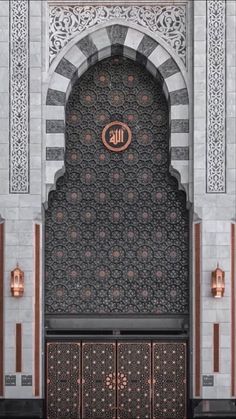 the front entrance to an ornate building with intricate carvings on it's walls and doors