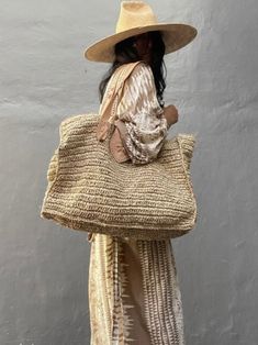 Casual style. Lightweight. Straw. Lined. Raffia natural fiber. Measurements are 50 cms. Length (19.68” inches) x 40 cms height (15.74” inches) x 15 cms width (5.9” inches). Color may be lighter or darker depending of the device it is displayed. Straw Beach Tote, Beach Vacation Style, Inch Bag, Straw Tote Bag, Oversized Bag, Details Pictures, Woven Raffia, Raffia Bag, Straw Tote