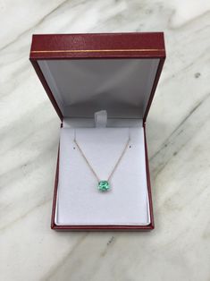 Featured here is a 1.32-carat stunning, Colombian emerald necklace in fine 14K yellow gold. Displayed in the center is a medium-light green emerald with incredible crystal clarity, accented by a simple four-prong gold mount, allowing for the emerald to be shown in full view. The earth mined, green Colombian emerald has a desirable lush green color with excellent qualities. An 18 inch is attached to the emerald pendant. This necklace is ideal for everyday use and is the perfect accessory to any o Emerald Diamond Necklace For Formal Occasions, Fine Jewelry Green Diamond Necklace In 14k Gold, Green Diamond Necklace In 14k Gold, Formal Emerald Necklaces With Diamond Cut, Formal Green Gemstone Diamond Necklace, Emerald Pendant Necklace With Diamond Cut, Formal Emerald Necklace With Diamond Cut, Fine Jewelry Green Diamond Cut Necklaces, Emerald Necklace With Diamond Cut In Fine Jewelry Style