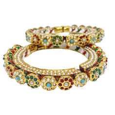 Discover the elegance of our Jadau bangles featuring Kundan and traditional designs. These charm bangles are meticulously crafted with high-quality materials and showcase the intricate artistry of Pachi Kundan jewelry. Perfect for special occasions, these openable Kada bangles blend traditional charm with contemporary style, making them a versatile addition to any jewelry collection. Whether you're dressing up for a wedding, festival, or a special event, these Jadau bangles with Kundan are designed to make you stand out. The openable feature adds convenience while maintaining the beauty and sophistication of the design. Traditional Bangle Jewelry For Navratri, Multicolor Hand Set Temple Jewelry Bangle, Traditional Bangle For Navratri, Traditional Navratri Bangle Jewelry, Adjustable Round Bangle For Diwali, Adjustable Bangle For Diwali, Festive Celebration Bangle, Bangle Jewelry For Navratri Celebration, Multicolor Temple Jewelry Bangle Bracelets