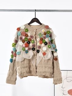 Shipping: Worldwide Express Shipping AvailableDelivery time: 7-15Days Fast ShippingReturns: Fast refund, 100% Money Back Guarantee. Cream Floral Embroidery Cardigan For Spring, Cream Floral Embroidered Cardigan For Spring, Winter Beige Outerwear With Floral Print, Beige Floral Print Outerwear For Winter, Winter Beige Floral Print Outerwear, Spring Patchwork Long Sleeve Cardigan, Beige Embroidered Cardigan, Cream Sweater With Floral Embroidery For Spring, Multicolor Patchwork Cardigan For Spring