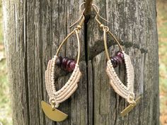 Garnet Macrame Earrings, Brass Marquise Half Moon Tribal Hippie Earrings, Beaded Bohemian Style Jewelry This statement hippie earrings are created using the macrame technique. It is made by a high quality tan waxed thread. Also, we use a Garnet chips beads and brass moon charms to complete design. Waxed thread gives the product durability and strength, and elegant natural appearance. It's a beautiful gift and a nice accessory what you can wear every day. Earrings characteristics: *Marquise brass Adjustable Macrame Earrings For Jewelry Making, Festival Adjustable Macrame Beaded Earrings, Adjustable Macrame Beaded Earrings For Festival, Adjustable Macrame Earrings, Adjustable Bohemian Brass Wrap Earrings, Bohemian Adjustable Nickel-free Wrap Earrings, Bohemian Adjustable Wrap Earrings For Festival, Adjustable Bohemian Wrap Earrings For Festivals, Natural Beaded Dangle Jewelry