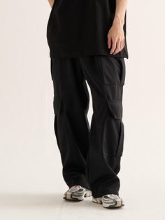 This is a casual and minimal pants by Analogmood that is made out of high quality and sturdy material. With distinctive mood of the design and comfortable wear, you can use it for your daily outfit.- Relaxed wide silhouette- Big cargo pockets detail on the side- Sweat fabric with soft touch and elasticity Black Wide-leg Utility Cargo Pants, Black Cotton Cargo Style Wide Leg Pants, Oversized Techwear Pants With Pockets, Black Cotton Wide Leg Cargo Pants, Black Wide-leg Cotton Cargo Pants, Black Wide-leg Sweatpants With Pockets, Black Relaxed Fit Parachute Pants With Cargo Pockets, Black Parachute Pants With Cargo Pockets And Relaxed Fit, Black Cotton Wide Leg Pants With Cargo Pockets