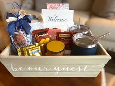 a basket filled with lots of food sitting on top of a table