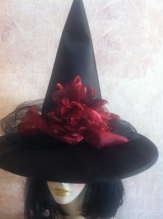 New this season! Scarlet or garnet red organza on this black satin hat with black tulle. Skull is optional. You can order the hat with or without. Just state your preference in the buyer notes! If no preference is stated it will not be added. Fits up to 22.75 inches head circumference. Fantasy Witch Hat, Witch Hat Halloween, Fantasy Witch, Halloween Witch Hat, Garnet Red, Black Tulle, Costume Hats, Witch Hat, Red Garnet