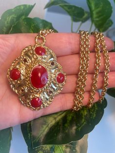 This listing is for a beautiful necklace.  Please review pics carefully before purchasing Red Pendant Necklace With Vintage Charm, Red Necklace With Vintage Charm As A Gift, Red Necklace With Vintage Charm For Gift, Red Vintage Charm Necklace For Gift, Retro Jewelry For Valentine's Day Party, Gold Christmas Collectible Jewelry, Retro Long Necklace As Gift, Collectible Red Medallion Jewelry, Retro Necklace With Lobster Clasp As Gift