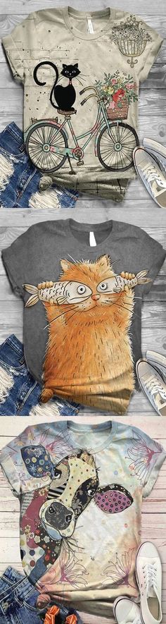 three shirts with different designs on them, one has an owl and the other has a cat