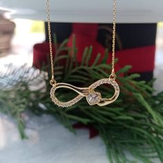 ✦ 14K Gold Infinity Heart Womens Pendant Jewelry - Gift Necklace for Mothers Day Valentines Day and Bridesmaid - Gift Gold Jewelry for Her ✦ The dimensions of our product are in the minimal category. ✦ Fast and Free Shipping. ✦ Our products are made of 14k pure gold. ✦ All our products have excellent quality and bright surface. ✦ Our products do not contain nickel and similar carcinogenic substances. ✦ Our products will be sent to you with a gift package. ✦ Average product weight (0.75mm CHAIN + Jewelry Valentines Day, Infinity Heart, Gift Package, Valentines Jewelry, Jewelry For Her, Pure Gold, Dainty Necklace, Bridesmaid Gift, Chain Pendants