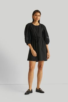 Classic and sophisticated, this black shirt dress has gorgeous balloon sleeves with cut-out embroidery while the flared skirt and side pocket round out the outfit Details:Made from 100% CottonRelaxed fitCinched tie front waistBalloon sleeves with cut out embroideryPockets on both sidesGarment length for Size M is 37 inchesAarzoo is 5'9" and is wearing size XS Black Dress With Puff Blouson Sleeves, Black Fall Dress With Blouson Sleeves, Fall Black Dress With Blouson Sleeves, Spring Black Dress With Balloon Sleeves, Black Balloon Sleeve Dress For Spring, Black Balloon Sleeve Dresses For Spring, Clothes Wishlist, Pajamas Gift, Black Shirt Dress