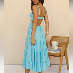 The Prettiest Blue Color. Perfect Summer Wear. Trusted Seller. Have Sold Over 1200+ Items. Summer Blue Backless Midi Dress, Blue Backless Midi Dress For Vacation, Light Blue Backless Vacation Dress, Chic Blue Backless Sundress, Blue Ruffled Sundress For Brunch, Blue Backless Sundress Midi Dress, Blue Ruffled Sundress For Garden Party, Blue Backless Sundress, Light Blue Maxi Dress For Brunch