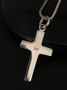 "Classic Cross Necklace, Sterling Silver Cross Pendant NECKLACE FEATURES: Metal: All components are made from solid .925 Sterling Silver Model is wearing 16\" in length solid .925 Sterling Silver Chain Length available: 16\", 18\" or 20\" MEASUREMENT: Sterling Silver Cross Pendant Height: 28 mm (1.1 inches) Width: 14 mm (0.55 inch) Your Sterling Silver Cross Necklace will arrive in a gift box, beautifully wrapped and ready for gifting Please send me a message if you have any questions before or Silver Crucifix Necklace For Everyday, Classic Sterling Silver Crucifix Necklace, Sterling Silver Cross Jewelry With Lobster Clasp, Minimalist Sterling Silver Crucifix Necklace, Classic Sterling Silver Pendant Cross Necklace, Minimalist Sterling Silver Pendant Cross Necklace, Classic Cross Necklace, Beaded Ankle Bracelets, Jewelry Cross