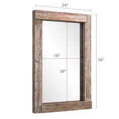 a wooden frame mirror with measurements for the size and width, on a white background