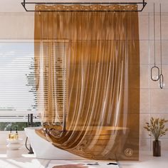 a bath room with a tub and a curtain