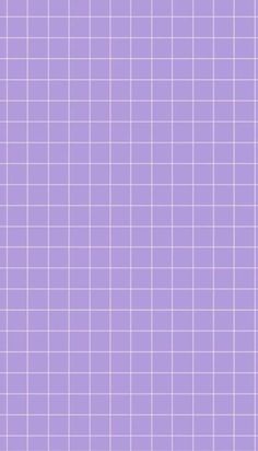 a purple tiled wall with white squares on it