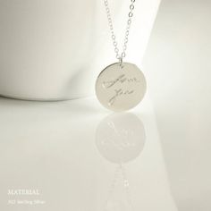 "Handwriting Necklace, Custom Handwriting Jewelry, Memorial Signature Necklace, Custom Disc Necklace, Actual Handwriting Necklace Your necklace will be made with the clearest engraving that will be in the actual penmanship style of the person (how each letter was written) on a beautifully polished bar. Just attach a clear image via an Etsy conversation once you placed the order. It's reversible so you can personalize the front and back to wear either side! If you want to cherish someone's handwr Sterling Silver Signature Jewelry For Personalized Gift, Silver Medallion Necklace For Anniversary Gift, Silver Meaningful Name Necklace For Gifts, Engraved Round Pendant Jewelry Gift, Engraved Round Pendant Name Necklace For Valentine's Day, Meaningful Silver Name Necklace For Mother's Day, Meaningful Jewelry With Engraving Option For Valentine's Day, Silver Meaningful Name Necklace For Mother's Day, Personalized Signature Jewelry As Gift