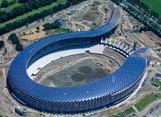 an aerial view of a large stadium with many seats on the top and bottom floor