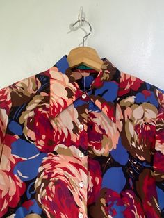 Vintage Cacharel Floral Silk Blouse! So cute! Long sleeves, a classic collar, and buttons up the front. Would best fit a size small, please refer to measurements. In overall great vintage condition with minor signs of wear on the arm pits. Approx. Measurements: Underarm to Underarm: 19" Sleeve Length: 24.5" Length: 23.5" Retro Collared Blouse For Work, Vintage Floral Print Blouse For Work, Vintage Collared Blouse With Placket, Retro Button-up Blouse For Work, Retro Button-up Workwear Blouse, Retro Collared Blouse For Vintage Fashion, Vintage Button-up Blouse With Placket, Vintage Button-up Office Blouse, Vintage Collared Blouse For Office